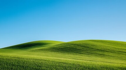 Fototapeta premium Picturesque Green Hills with Wind Turbines Representing Renewable Energy and Sustainability