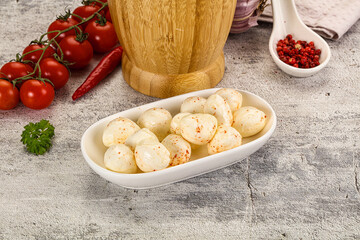 Mozzarella balls cheese in the bowl