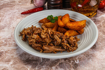 Baked shredded pork with potato