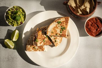 Black bean quesadillas with guacamole, salsa, and tortilla chips