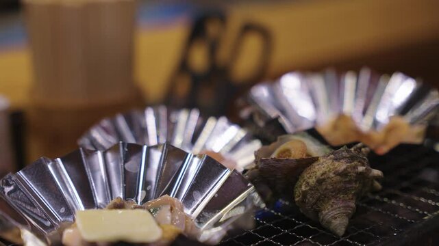 Turban Shells and Shellfish On Charcoal Grill, Japanese Seafood Dishes