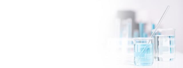 Close-up Laboratory test tube with blue liquid for chemistry chemical medicine medical research copy space banner