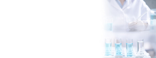 Close-up Laboratory test tube with blue liquid for chemistry chemical medicine medical research copy space banner