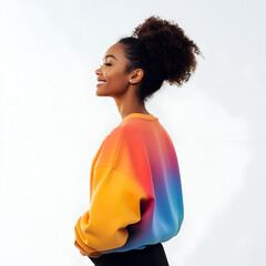 Smiling woman in profile, wearing a vibrant ombre sweatshirt, showcasing diversity and positive vibes