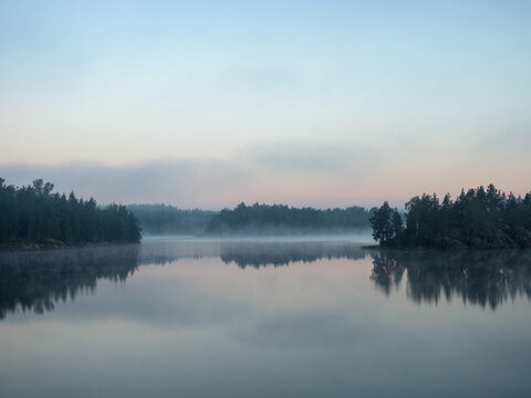landscape with fog on a lake
