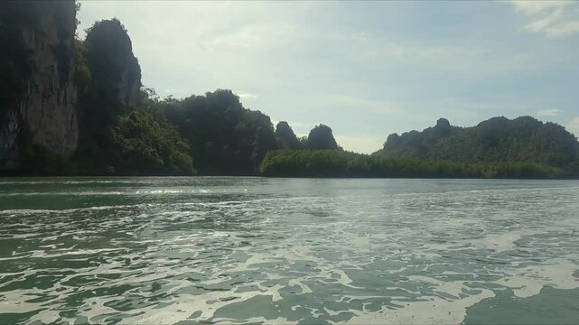 Langkawi POV fast boat along tropical river