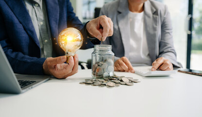 business team hand showing creative business strategy with light bulb