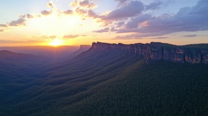 Majestic Sunset Over Rolling Hills And Cliff Face