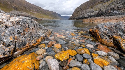 Colorful rocks, calm bay, mountain valley. Nature scene for travel brochure