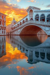 Golden sunset reflection over the rialto bridge venice italy landscape