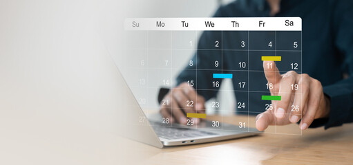 Businessman manages time for effective work. Calendar on the virtual screen interface, Businessman...