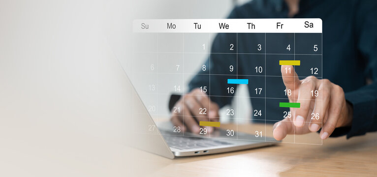 Businessman manages time for effective work. Calendar on the virtual screen interface, Businessman paste Post-it on important days on the calendar Important appointment dates
