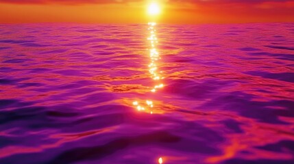 Obraz premium Sunset over the ocean, vibrant colors reflecting on water surface