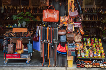 shop bags, accessories and handmade genuine leather goods at Hoi An street market in Vietnam in Asia