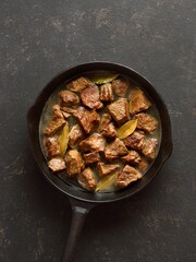 Braised beef in cast iron skillet