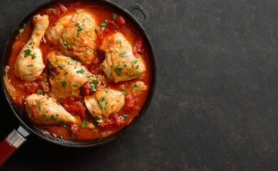 Georgian chicken stew with tomatoes and herbs