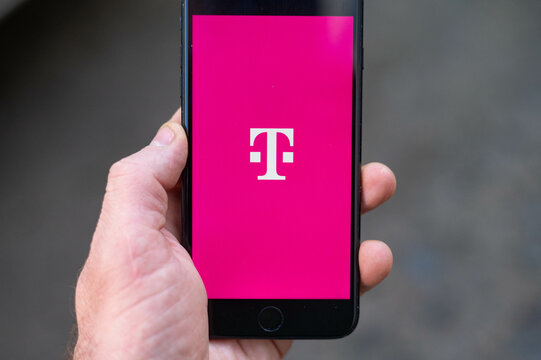 t-mobile logo on phone screen stock image.