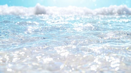 Sparkling ocean waves on sunny beach. Vacation background