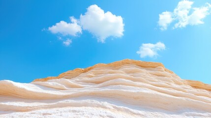 Fototapeta premium White sand dune under blue sky, travel photography