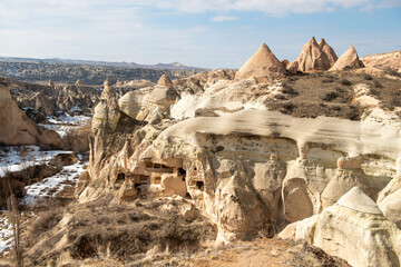 Rock formations of the Red Valley (Valley of Roses), Cappadocia, Turkey , in winter.