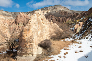 Rock formations of the Red Valley (Valley of Roses), Cappadocia, Turkey , in winter.