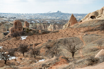 Rock formations of the Red Valley (Valley of Roses), Cappadocia, Turkey , in winter.