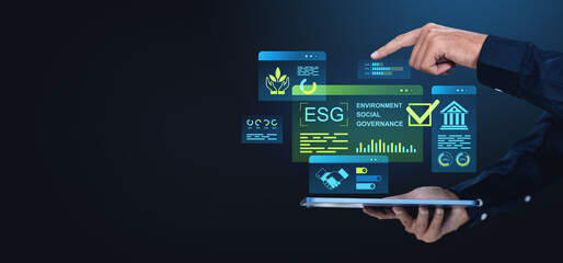 ESG investment strategy concept with holographic icons on tablet in business setting.