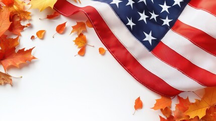 Fototapeta premium Close-up of an American flag with fallen autumn leaves scattered around, soft focus background enhancing the seasonal theme