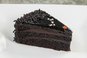 Chocolate cake piece with cream