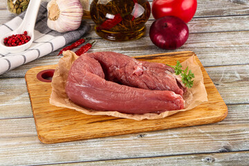 Raw pork tenderloin for cooking
