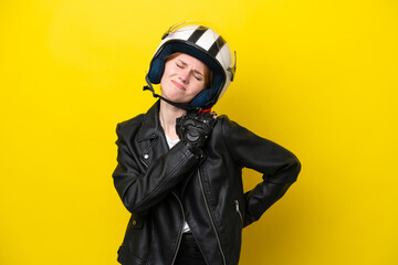 Young English woman with a motorcycle helmet isolated on yellow background suffering from pain in...