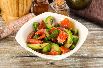 Salad with avocado and salmon