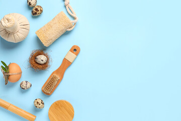 Composition with spa supplies and Easter eggs on color background