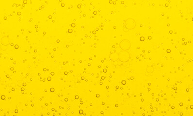 Macro microscope yellow bubble texture, Close-up Yellow bubbles and drops oil background . golden...