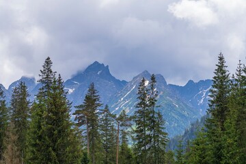 View of the peaks of the Tatra Mountains in Poland. Beautiful landscape with mountains and clouds.