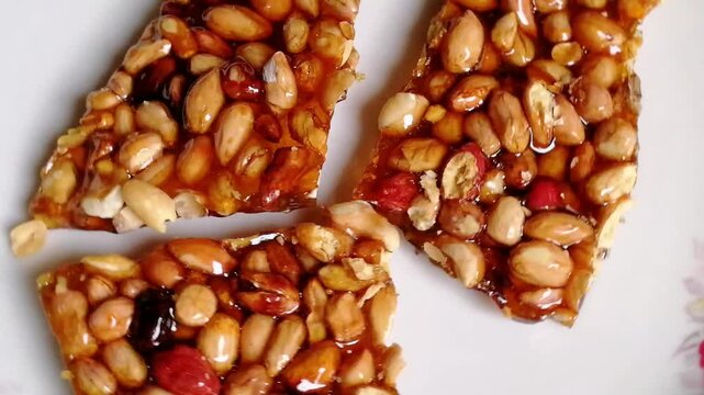 Crystal honey and caramel mixed peanut bar for presentation, advertising and reference. Most tasty item for boosting body energy