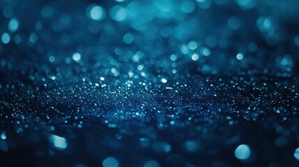 Blue glitter bokeh texture, dark background, festive design, website backdrop