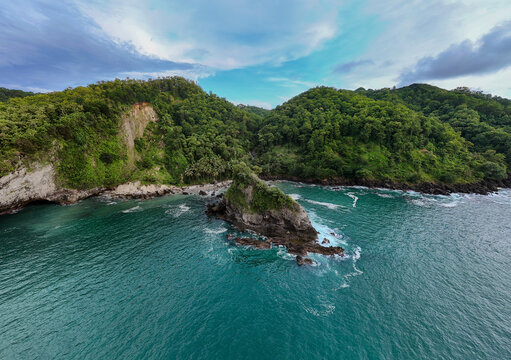 panoramic view of the island with blue sea and clear sky in Kebumen city, Indonesia.