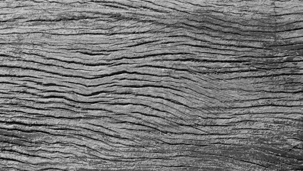 Fototapeta premium Black wooden background. Free space for your text. Top view.
