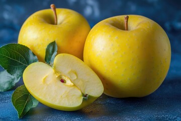 Fresh yellow apples on a wooden table, suitable for food photography or still life compositions