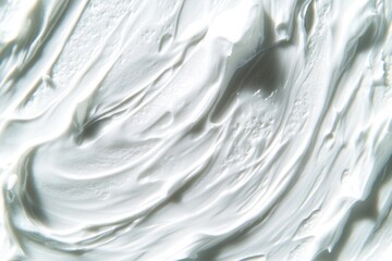 A close-up view of a bowl filled with fluffy whipped cream