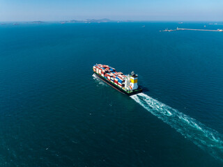 container ship sailing full speed with beautiful wave pattern line, cargo logistic and transportation import export of International,