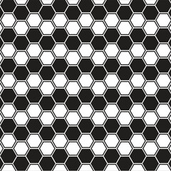 Seamless pattern with black and white hexagons on white background