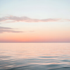 Fototapeta premium Pastel Sunset Over the Sea: A serene seascape bathed in the soft hues of a pastel sunset, with delicate clouds reflecting the warm light on the tranquil water.