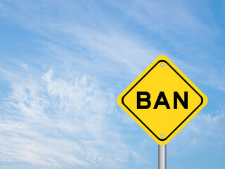Yellow transportation sign with word ban on blue color sky background