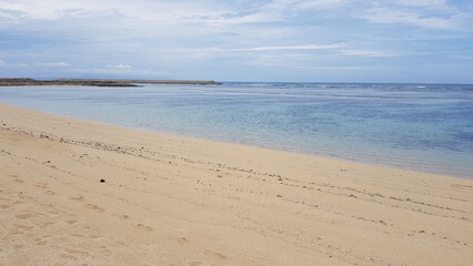 empty beach in the afternoon with clear blue sky