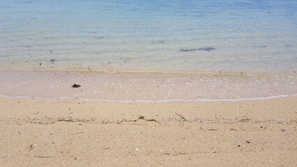 empty beach in the morning with clear water