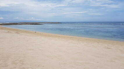 empty beach in the afternoon with clear blue sky