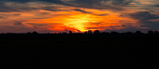 Picturesque sunset near the village of Rybina, Żuławy, northern Poland