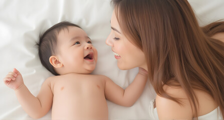 Happy Mother and Baby Bonding in Bed